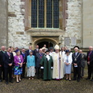 group of people outside church.