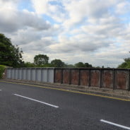 Railway bridge, partly painted.