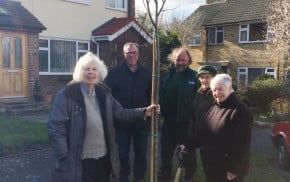 The photo shows Jane Marley (right) with two of her neighbours, Cllr Stephen Hill and Robin Cooper from Farnham Town Council.