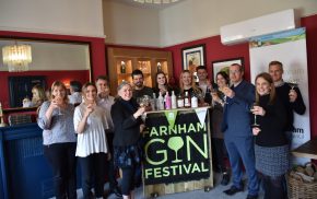 Group of people holding glasses of gin