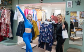 Two females in a clothes shop.