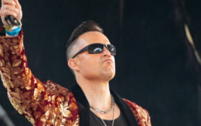 Man in sunglasses and colourful jacket