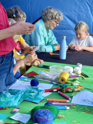 Children and adults crafting.