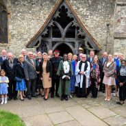 Group of people outside a church.