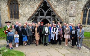 Group of people outside a church.